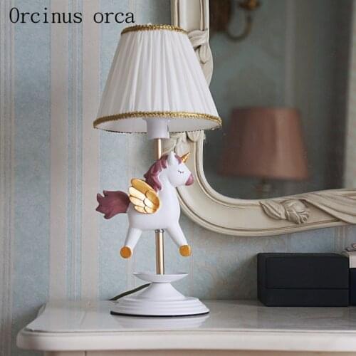 Cartoon creative merry go round desk lamp Boy Girl Bedroom bedside lamp American personality LED animal resin desk lamp