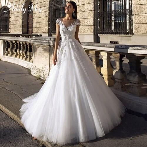 Adoly Mey Elegant Scoop Neck Backless Bride A-Line Wedding Dress 2020 Luxury Beaded Appliques Court Train Princess Wedding Gowns