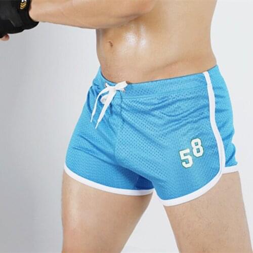 Sport man Summer mens sporting shorts men casual hot pants breathless baggy track shorts youth fast dry arrow pants
