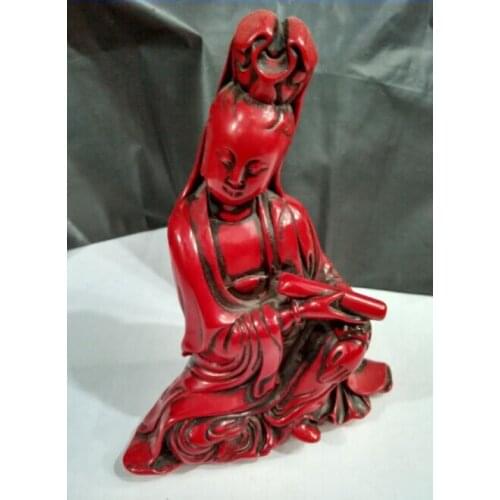 Chinese hand carved, red coral goddess of mercy statue, decorated with ornaments