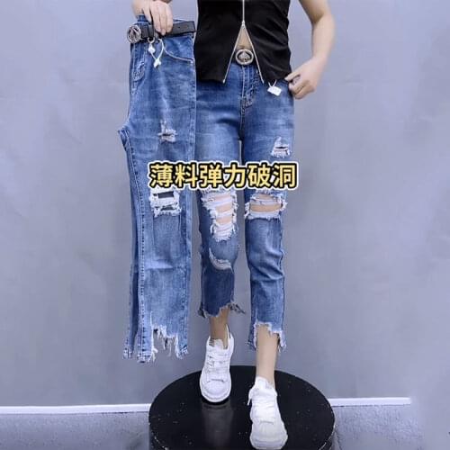Mom Jeans Ripped Jeans All-match Ripped Jeans Female Spring and Summer High-waisted Straight Beggar Raw Edge Cropped Trousers
