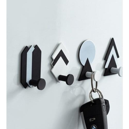 Nordic simple geometric strong viscose hook iron art non perforated clothes rack on the back wall of the door of the B & B room