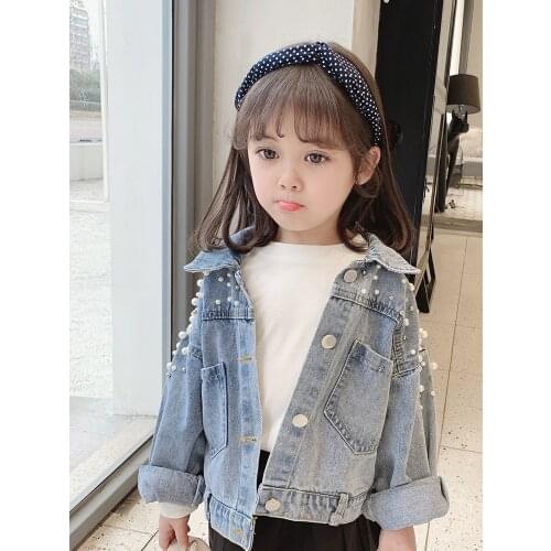 A girls beaded denim jacket