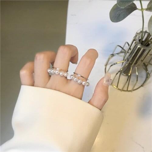 Korea individual character inlays the hollow ring of pearl, fashionable and contracted double layer opens the ring of the woman