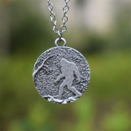 SanLan 10pcs Sasquatch Bigfoot necklace under moon in the forest tree jewelry