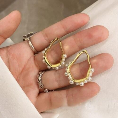 U-Magical Retro Waterdrop Geometrical Pearl Dangle Earring for Women Temperament Textured Hollow Metal Earring Jewelry Exquisite