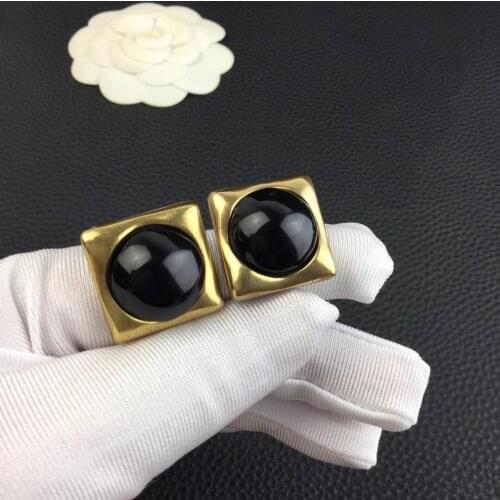 Europe and the United States cold wind holy home black round metal square nails advanced sense earrings