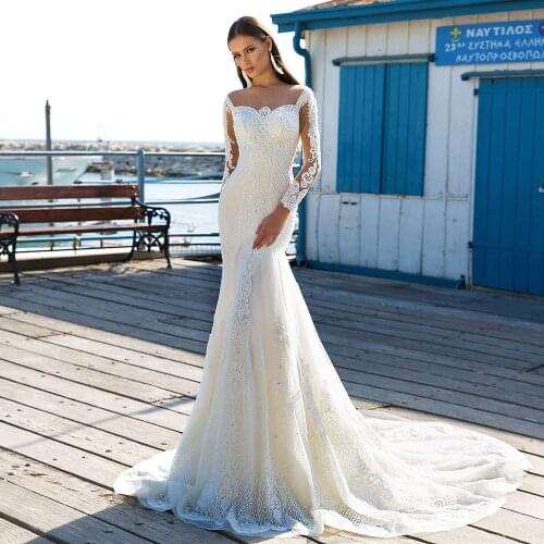 Elegant Mermaid Wedding Dresses Beach O Neck Long Sleeves Illusion Button Beading Appliqued Crystal White Vintage Bridal Gowns