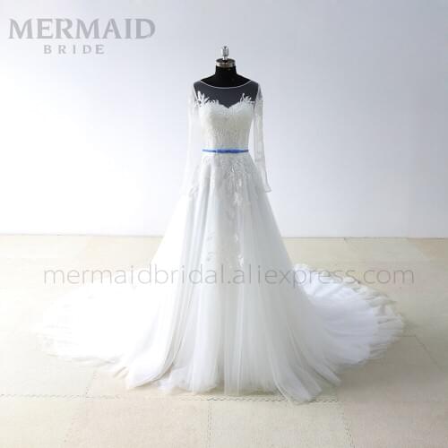 Illusion long sleeve court train lace wedding dress