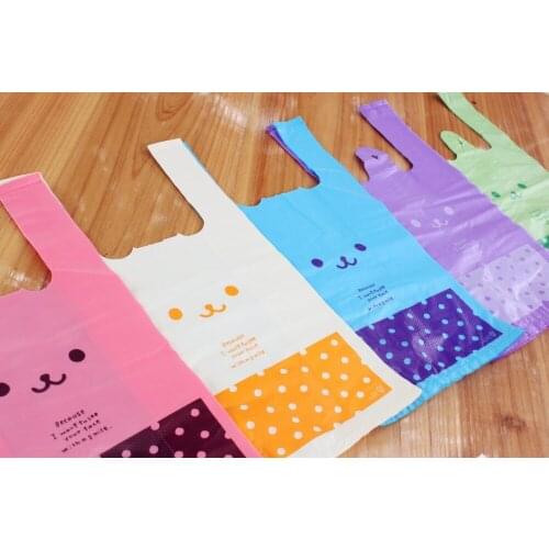 Free shipping size 23*43cm market shopping packaging underwear plastic bags withe handle packaging clothes bag