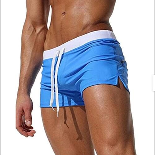 Mens swimsuit boy swimsuit boxer shorts swim trunks swimming surfing solid color pocket design swim trunks