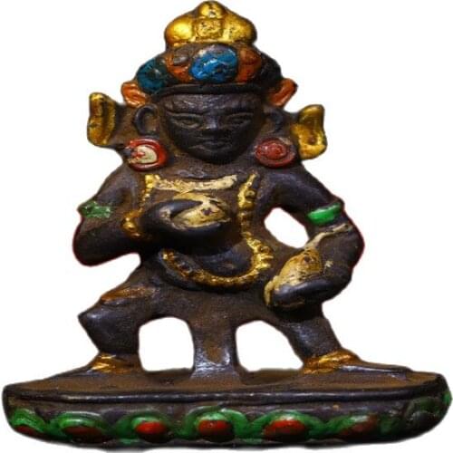 Early collection of carved painted black god of wealth statue