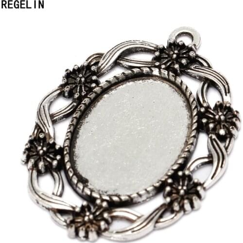 REGELIN 10pcs/lot Antique Bronze Tone Oval filigree Frame Cabochon Settings Blank Base Fit 18*25mm Cameo Jewelery Making Finding