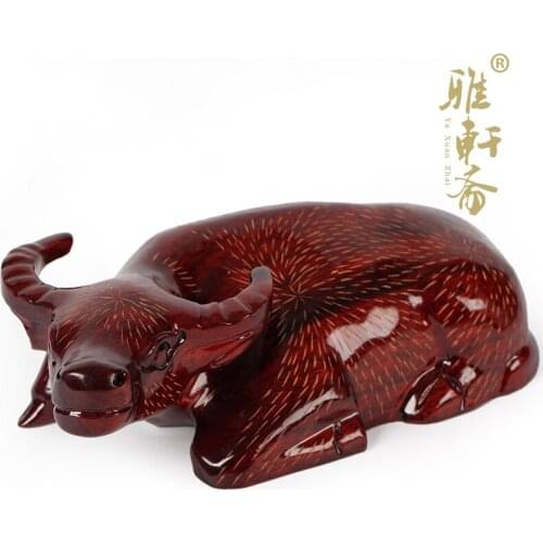 T rosewood woodcarving and ox woniu wood brought reminders Cai feng shui ornaments business gifts