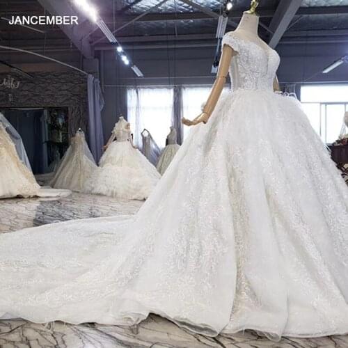 HTL1604 Beaded Luxurious Holy White Princess With Feathers Wedding Dress 2020 Short Sleeve Big Train vestido de noiva princesa