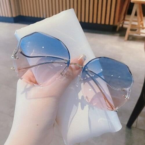 New Design Rimless Sunglasses Fashion Trend Hot Unisex Protection Eyewear Women Men Outdoor Driving No Frame Metal Legs Oval