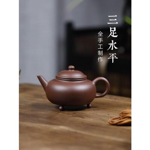 West old purple clay] copy ancient money all hand yixing recommended famous ceramic tea-pot three-legged pot level