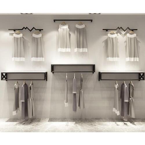 Nordic clothing store display rack wall hanging men and womens clothing store wall hanging rack white side wall hanging