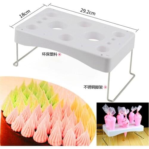 Mounted cream framed bag nozzle mounted on a cake frame mounted on a flower