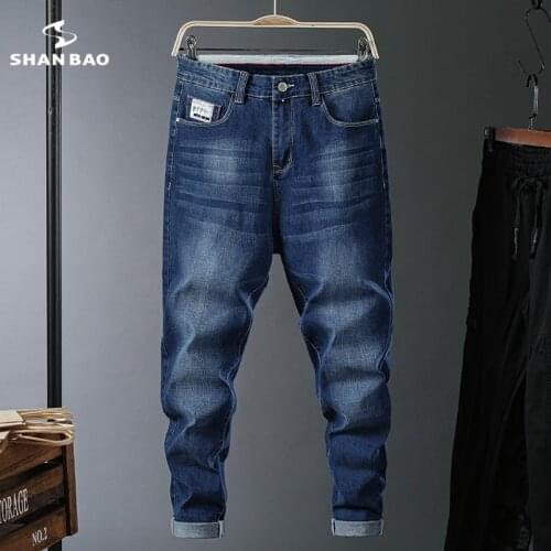SHAN BAO 2021 Autumn Brand Plus Size Loose Harem Jeans Classic Pocket Patching Style Youth Mens Fashion Denim Jeans