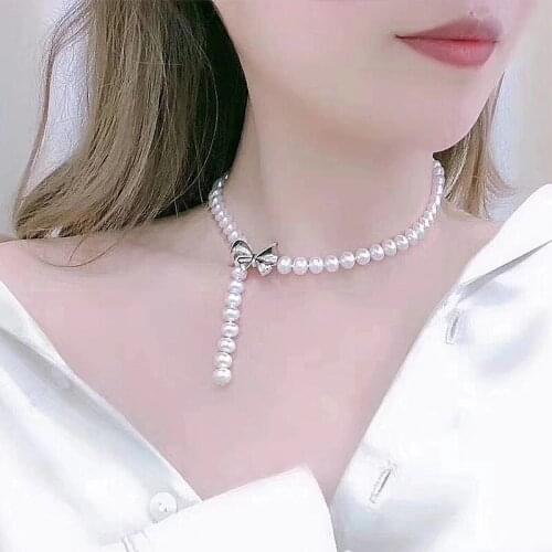 Hot sell new 25inch 8-9mm natural white freshwater pearl necklace zircon Bowknot accessories pendant fashion jewelry