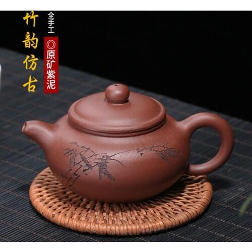 Yixing recommended small mini tea rain medium sand ore purple bamboo archaize all hand carved mud paint manufacturers