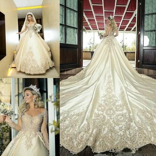 2020 Gorgeous Sheer Long Sleeves A-Line Wedding Dresses Lace Appliques Beaded Bridal Gowns Long Robe De Marriage Custom Plus Siz