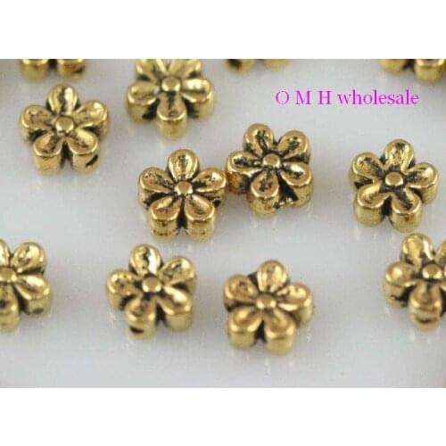 OMH wholesale Free ship 30pcs golden flower spacer beads Jewelry metal beads 7mm ZL511