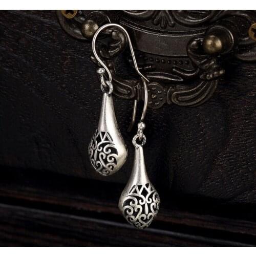 S990 pure silver vintage hollow vase totem sterling silver wild lady earrings