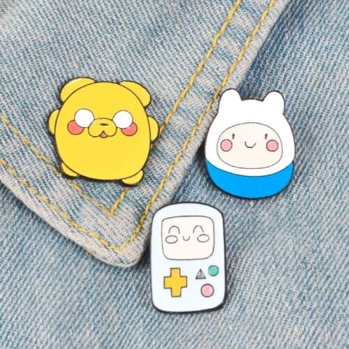 Cartoon game machine tumbler small yellow pig fashion personality brooch child really funny clothes backpack jewelry gift
