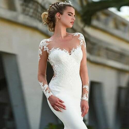 Sheer Long Sleeves Satin Mermaid Wedding Dresses 2020 Tulle Lace Applique Sweep Train Wedding Bridal Gowns With Buttons Robes De