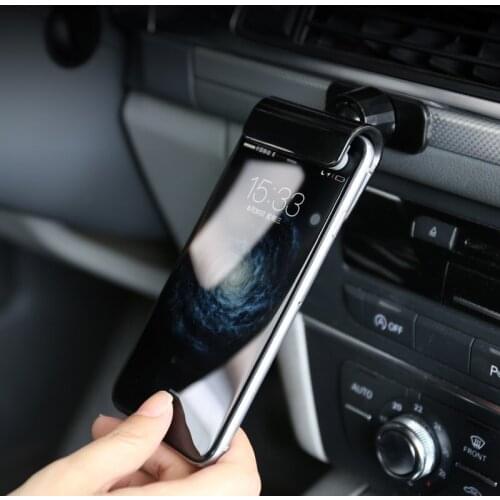 2021 May new Car phone holder Adhesive bottom bracket for instrument panel In-car air outlet navigation creative support frame