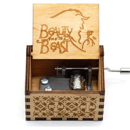 Direct selling creative wood carving music box beast and beauty Jurassic Park hand-cranked music box Christmas Halloween gif