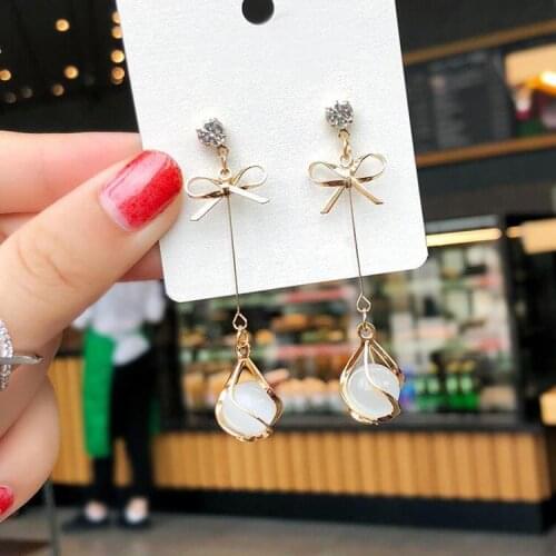 2021 Sweet temperament fashion jewelry Women Crystal from Swarovskis 925 silver needle simple wild bow tassel earrings female