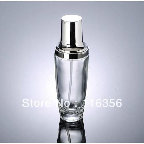 100ml transparent glass lotion bottle with silver pump for Cosmetic Packaging