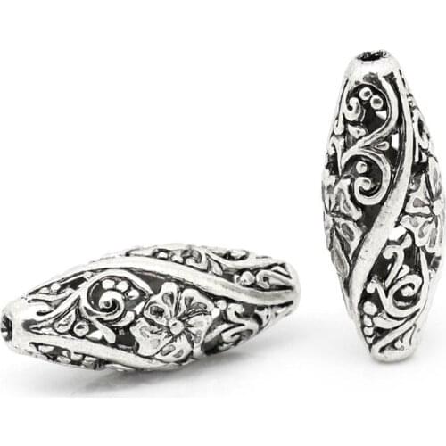 DoreenBeads Zinc Alloy Filigree Spacer Beads Oval Antique Silver Color Flower Hollow Carved DIY Jewelry About 26mm x 11mm,10PCs