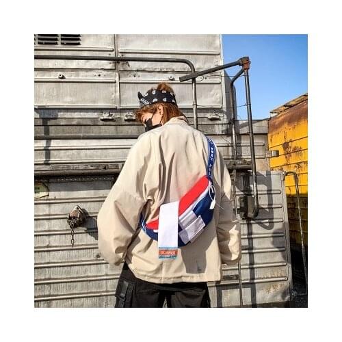 Chest bag men and women student couple 2020 new cross-body bag fashion trend hit color canvas waist bag