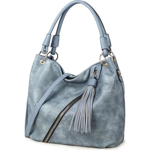 2021 new European and American bestselling handbag, large capacity fashion tassel one-shoulder woman bag