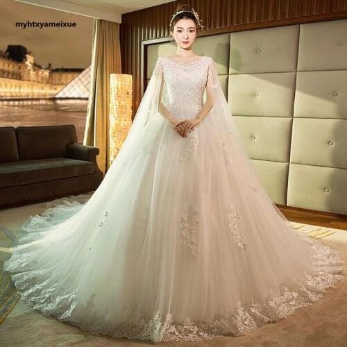 Cream white applique bridal wedding dress heavy craft beaded O neck back tie A pendulum wedding dress custom Red Wedding Dress