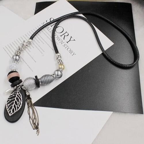 New Original Fashion Tassel Wax Rope Necklace Retro Hollow Leaf Long Sweater Chain Womens Clothing Accessories