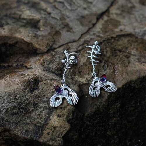 European and American retro hip-hop style personality trend womens earrings fishtail purple earrings tassel irregular