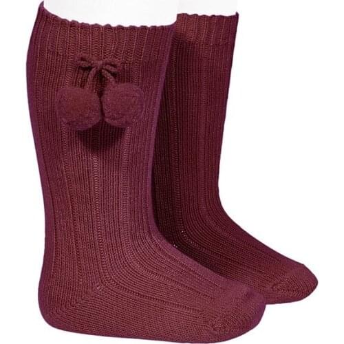 Ribbed high socks with Condor tassels