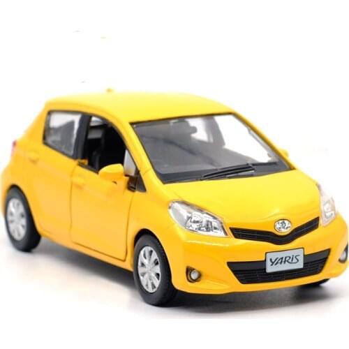 1:36 Toyota Yaris Vitz alloy model simulated die-casting pull back door childrens toys birthday gift free shipping