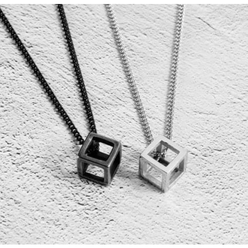 European and American Retro Simple Hollow Pendant Mens and Womens Titanium Steel Necklace Personality Quartet Jewelry