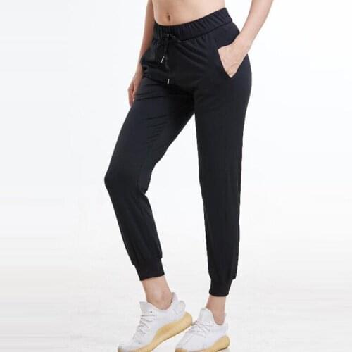 2020 Women Naked-feel Fabric Loose Fit Sport Jogger Leggings with two side pockets