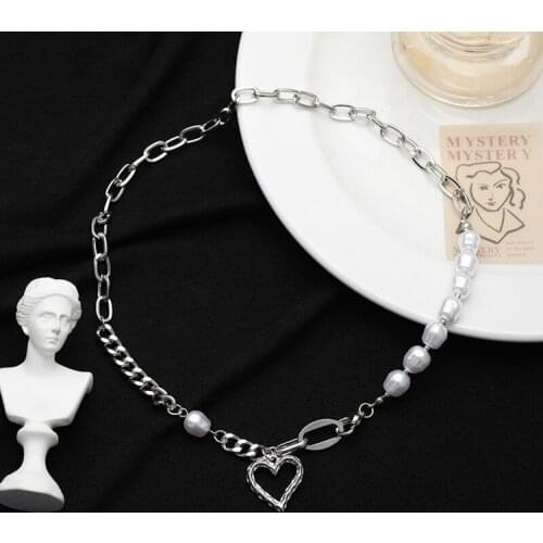 Pearl patchwork necklace summer female ins hip hop light luxury personality cold wind collarbone chain hollow love new tide