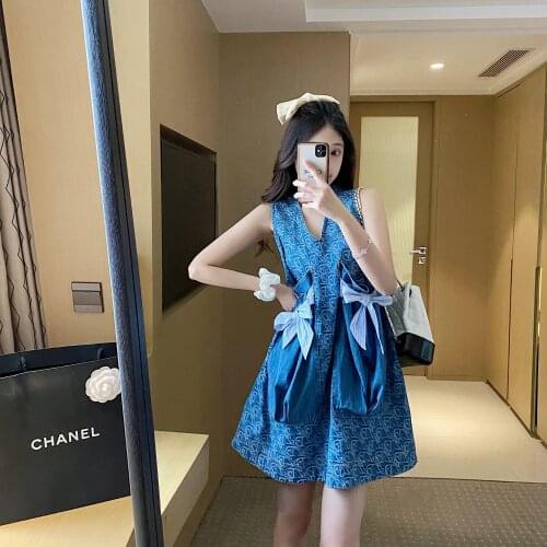 2021 KoukiMa New Arrival Korean Style A-line Sleeveless V-Neck Dress Shoulder Tank Dress Kawaii Bow Pocket Denim Mini Dress Girl