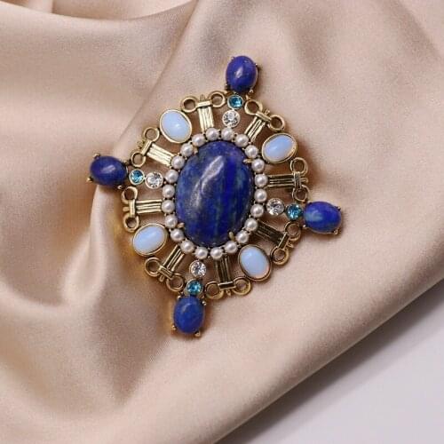 Vintage palace blue oval brooch