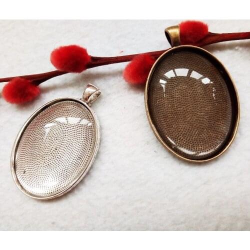 Free shipping 1pcs size 32*48mm inner size 30*40mm silver or bronze oval base Tray Pendant (include one suitable glass)