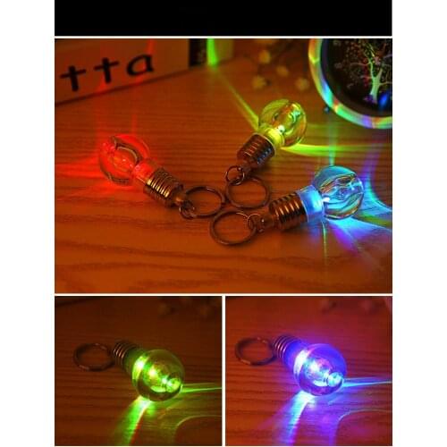 New special luminous Mini seven color light bulb key chain schoolbag pendant accessories creative small flashlight key gift lamp